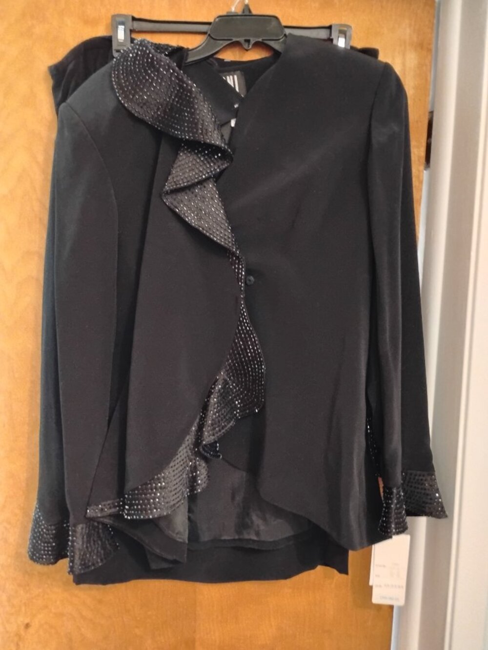 A black plus size suit (22) with black onyx  detailing, w/skirt